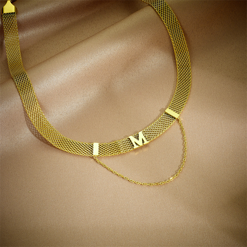 European and American fashion niche design metal titanium steel mesh tassel chain letter M accessory short collarbone necklace full figure