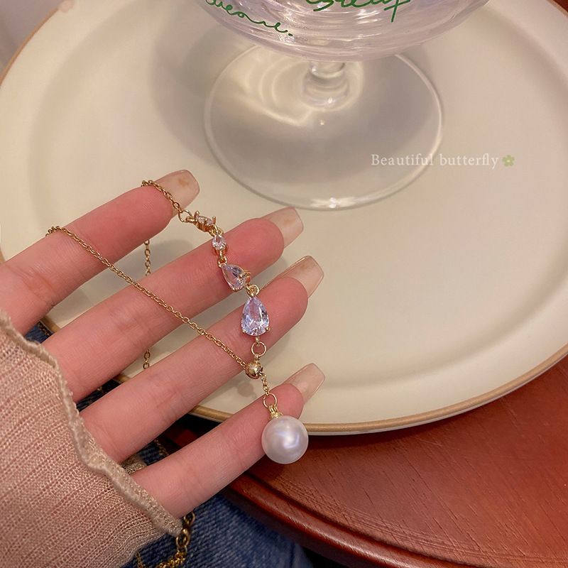 The new Korean pearl pendant necklace is a light luxury, niche and high-end accessory for women, versatile and personalized, and is a popular collarbone chain accessory Specification drawing