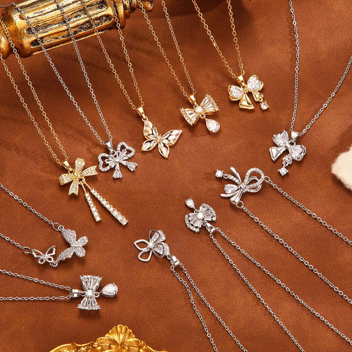 New women's necklace with micro-inlaid zircon bow water drop necklace, Japanese and Korean style niche design collarbone chain accessory wholesale full figure