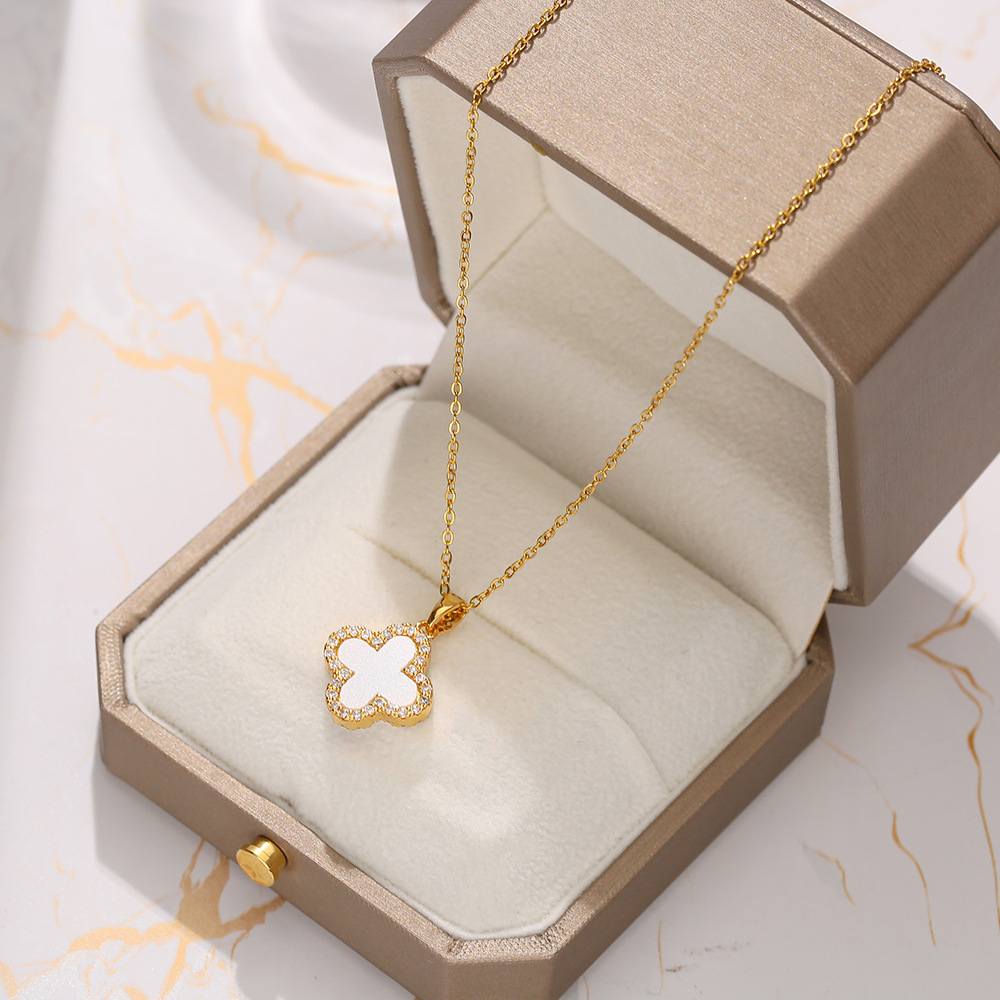 Golden luxury four-leaf clover necklace, women's black and white double-sided design sense, popular collarbone chain, 18k gold-plated neckchain full figure