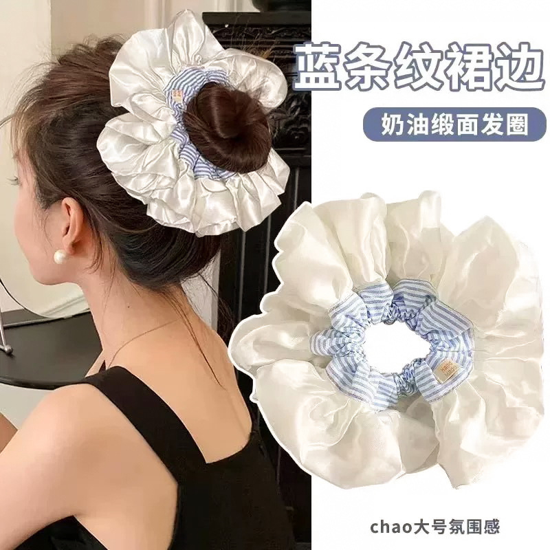 Korean-style oversized blue striped satin large intestinal hair band, a laid-back and stylish bun hair accessory for girls Application Scenario