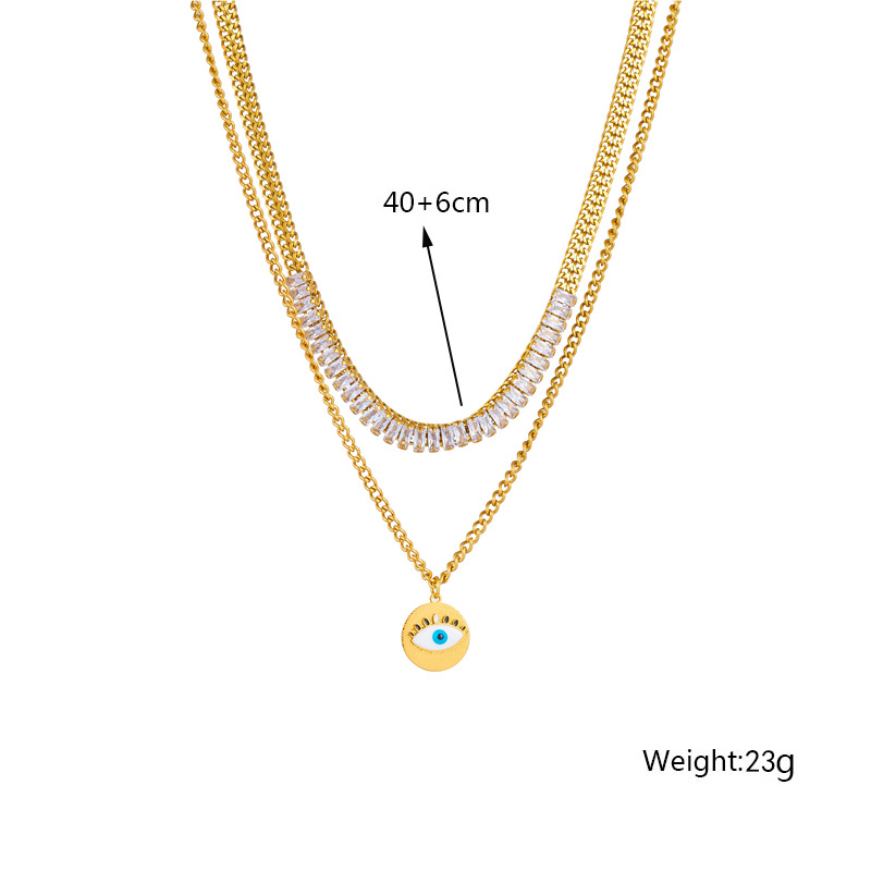 This is a unique and fashionable design from Europe and America. It features a double-layered chain with diamonds, a round eye pendant, and a titanium steel gold-plated necklace Application Scenario