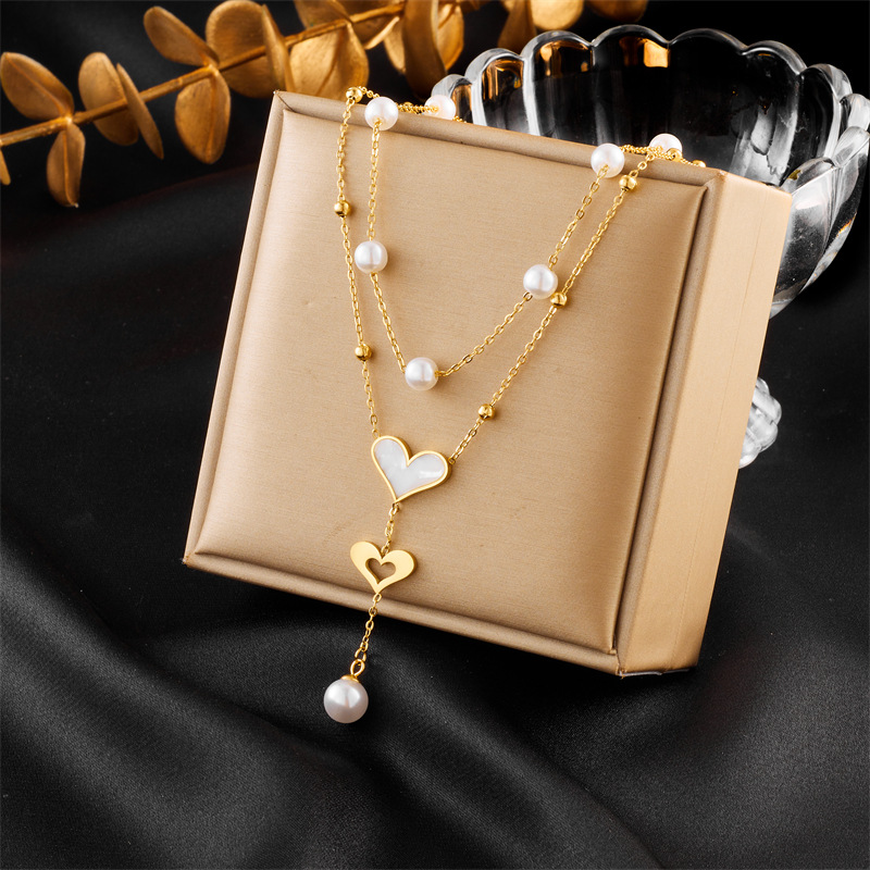 European and American fashion, niche and retro double-chain pearl butterfly tassel pendant necklace full figure