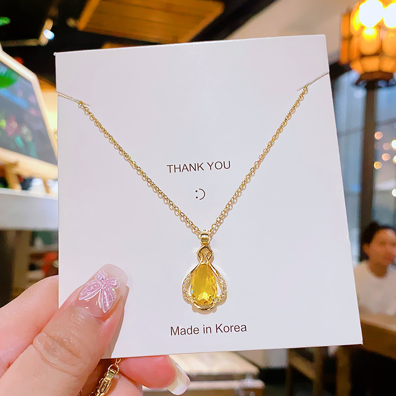 Yellow water drop zircon perfume bottle pendant, titanium steel necklace, women's niche design sense, versatile collarbone chain, elegant accessory Specification drawing