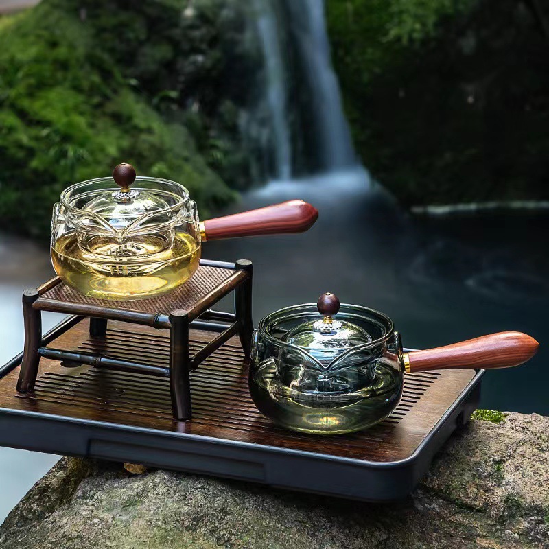 Wholesale high borosilicate glass Xiaoyao teapots with side handles, Gongfu teapots, high-temperature resistant separators, filters and tea brewing sets full figure