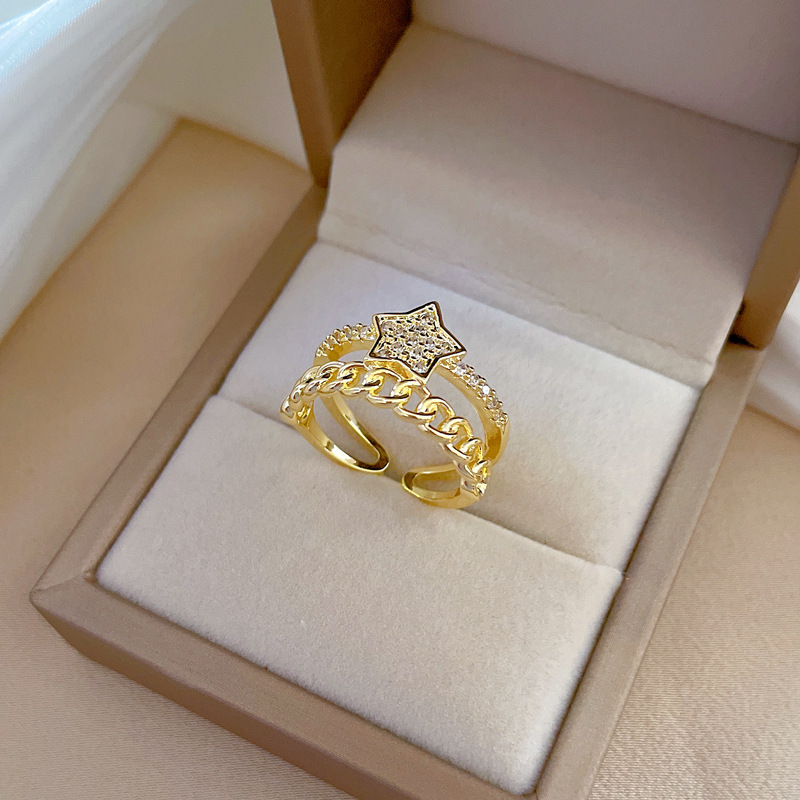 【 Real gold electroplating 】 Open five-pointed star female fashion slightly inlaid light luxury ring index finger ring, the same style as Internet celebrities, cold style Specification drawing