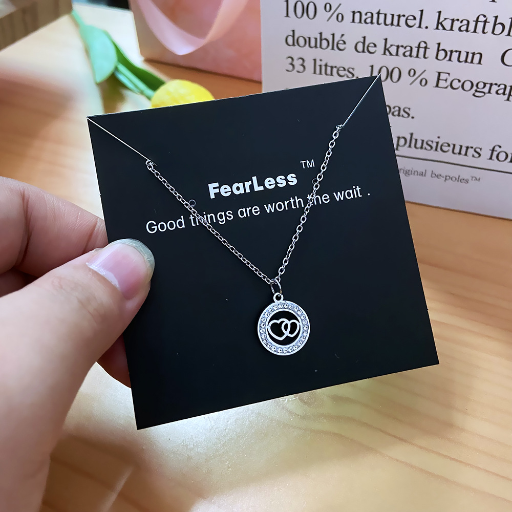A light luxury and simple full-diamond heart-shaped necklace for women, a fashionable titanium steel collarbone chain that doesn't fade, a trendy accessory with a unique and high-end feel Application Scenario