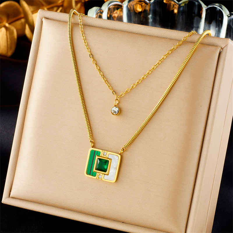A fashionable and niche design of double-layer stacked titanium steel gold-plated chain square pendant accessory necklace from Europe and America full figure