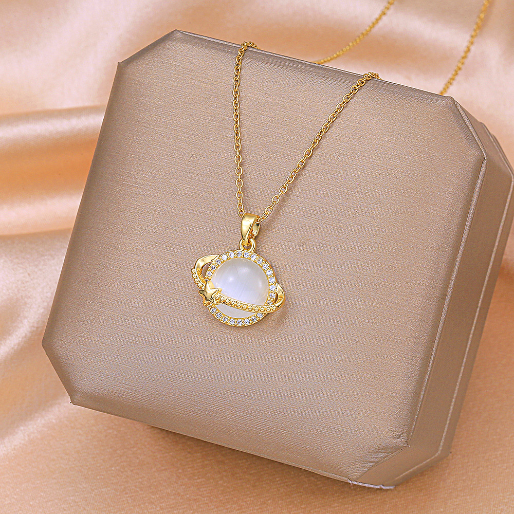 The 2023 new light luxury cat's Eye Planet necklace, a unique and elegant titanium steel collarbone chain, is a trendy and simple accessory full figure