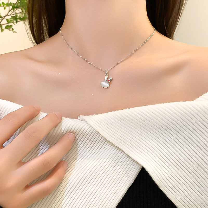 Silver cat's eye stone little rabbit necklace, a unique and light luxury design for women, a popular collarbone chain, a versatile titanium steel accessory Application Scenario