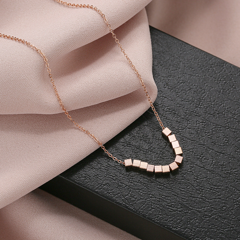 Simple and three-dimensional small square pendant, 18k rose gold, eight directions bringing wealth titanium steel necklace, female personality Internet celebrity collarbone chain Application Scenario