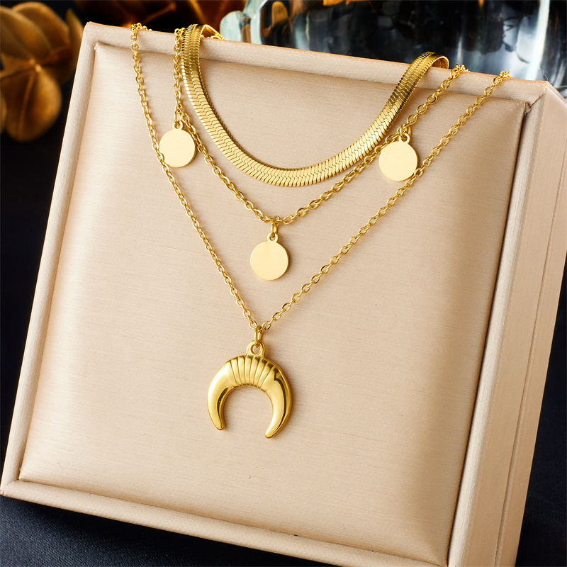 A retro and high-end European and American niche style, gold-plated titanium steel round plate moon accessory, multi-layer layered wearing jewelry necklace full figure