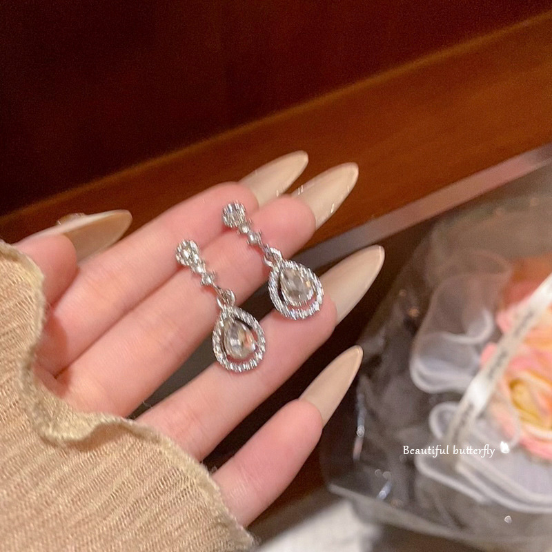 Exquisite sparkling diamond water drop earrings for women, 2024 new bestsellers, stud earrings, unique style, high-end earrings wholesale Specification drawing
