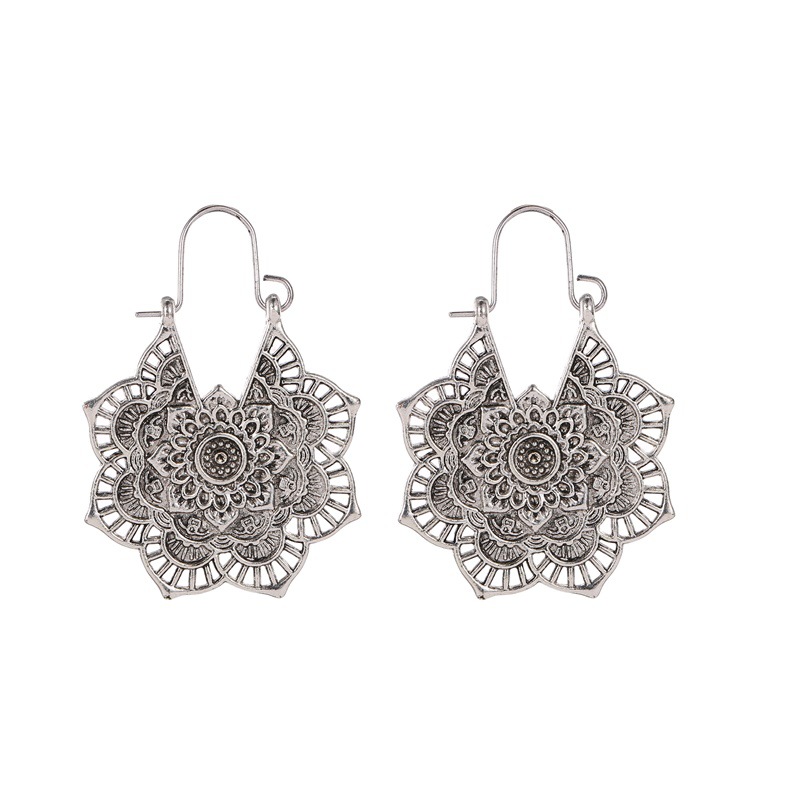 Ethnic-style earrings, exotic retro metal hollowed-out flower earrings, Bohemian carved court-style earrings Item Picture