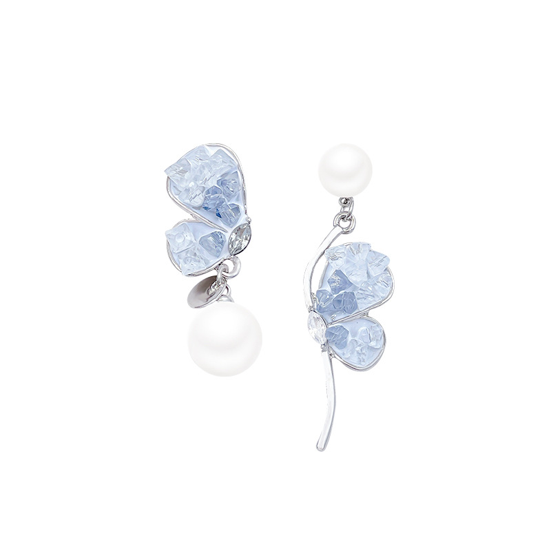 Asymmetrical milky blue ice crystal earrings exude a sense of sophistication, freshness and girlish charm. 925 silver needle earrings are trendy Item Picture