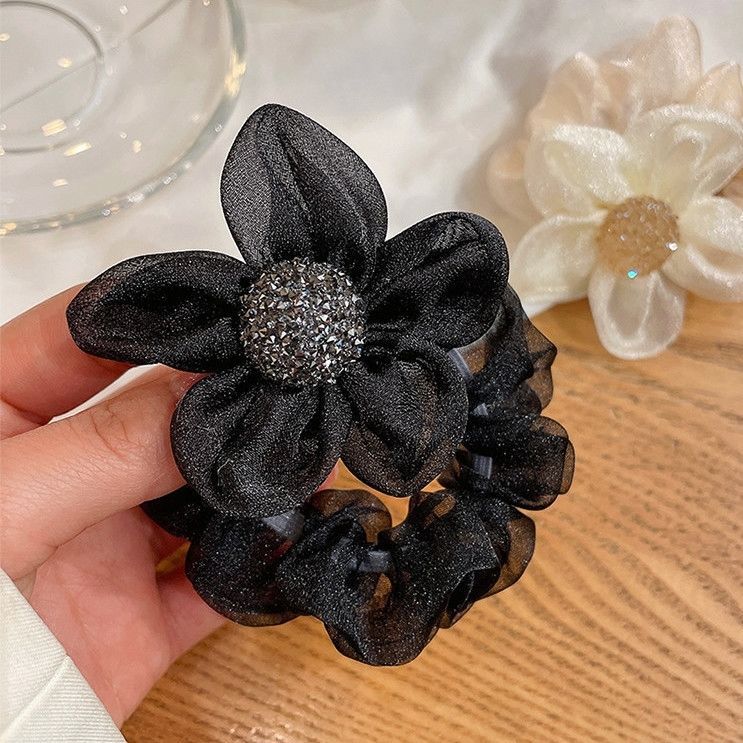 Two light luxury mesh fabric knotted hair accessories, shiny water diamonds, sun and flower hair bands, ponytail hair ties, and bun hairstyle Application Scenario