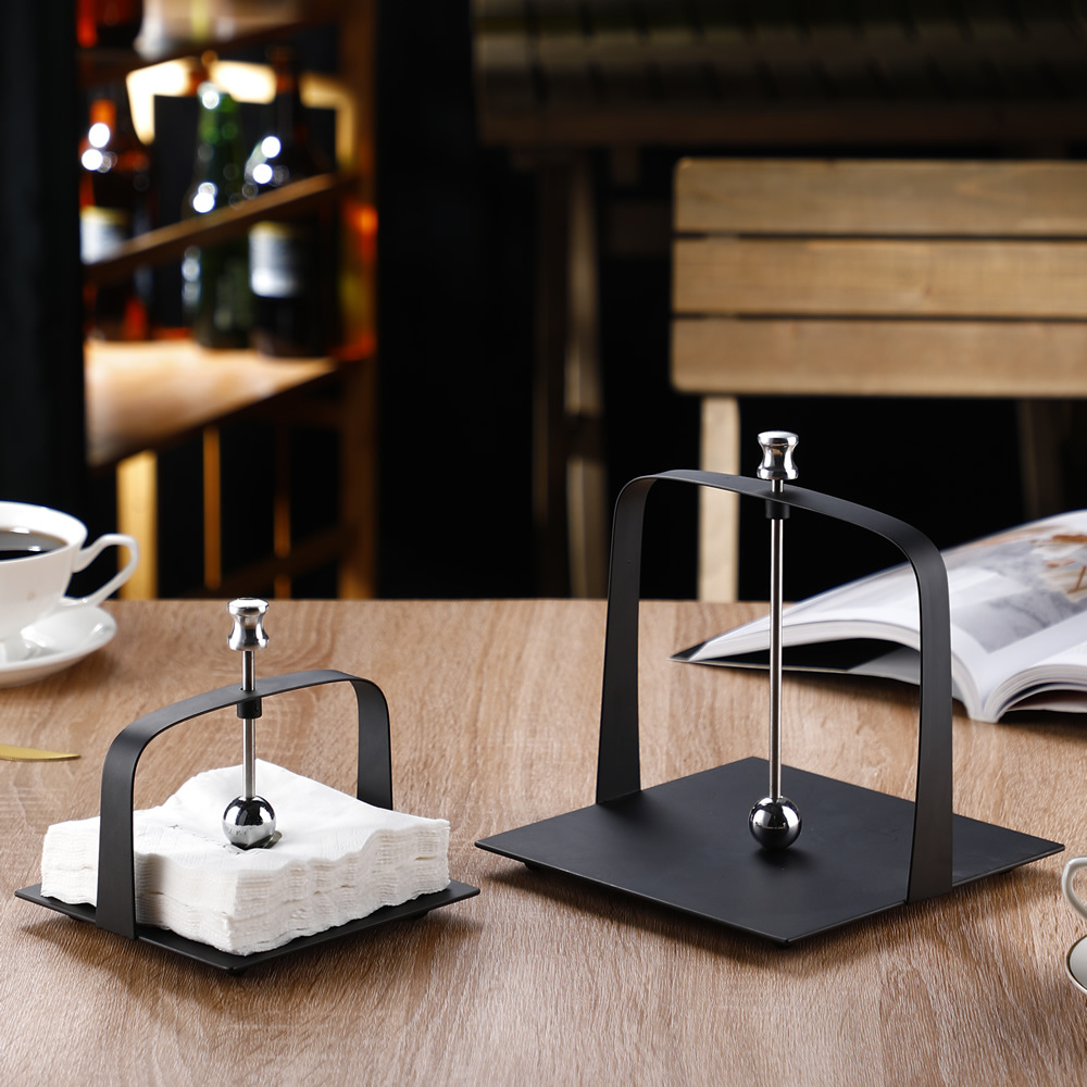 Creative stainless steel tissue holder, square stand, restaurant and hotel countertop tissue holder, simple napkin holder, European-style paper pressing stand Application Scenario