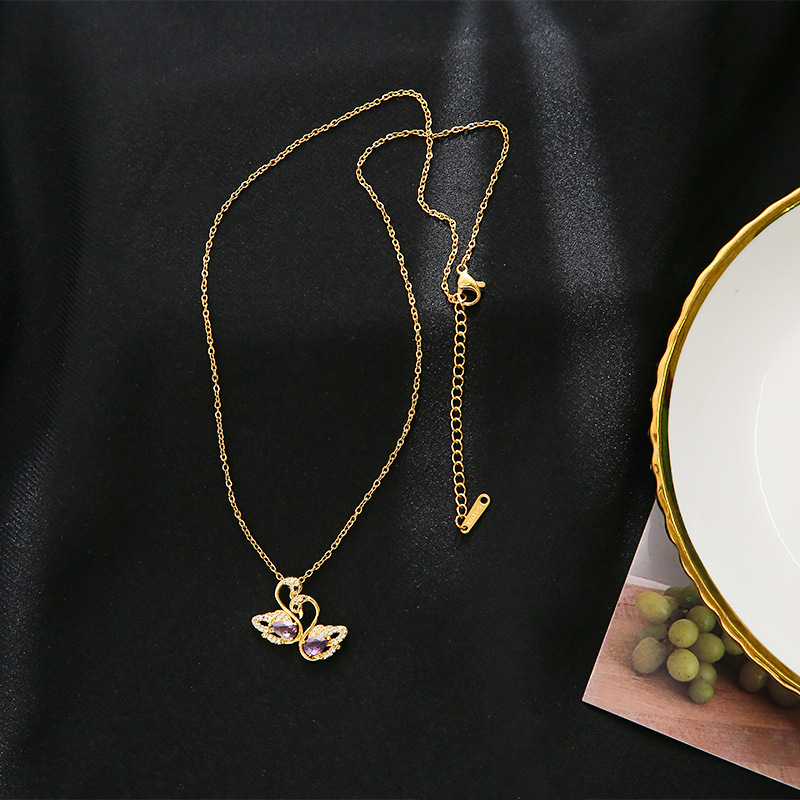 A genuine gold electroplated double swan titanium steel necklace for women, a niche, light luxury brand with full diamonds. It is a fashionable and versatile accessory with exquisite craftsmanship details Picture