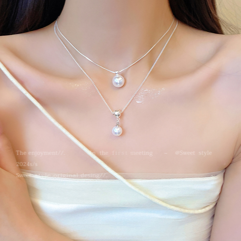 Pearl pendant necklace, women's light luxury, niche and high-end collarbone chain, 2024 bestseller, elegant neckchain accessory wholesale full figure