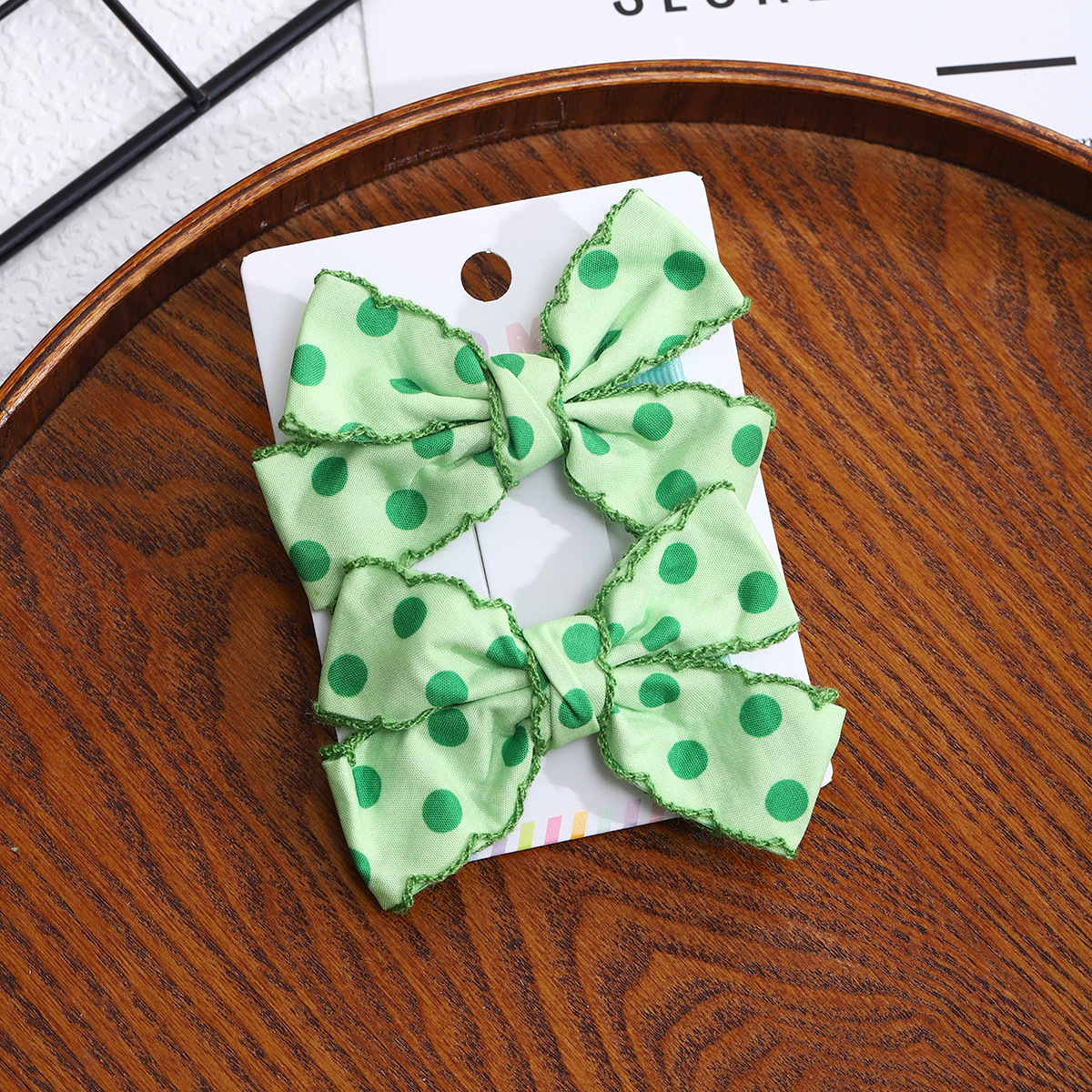 Korean-style cute bow hair clips, polka dot duckbill clips, children's princess side clips, exquisite back of the head little girl headwear Application Scenario
