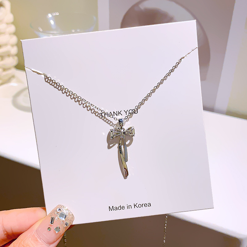 Fashionable and elegant, light luxury, full diamond bow tassel necklace for women, unique and versatile, high-end collarbone chain, silver accessory details Picture