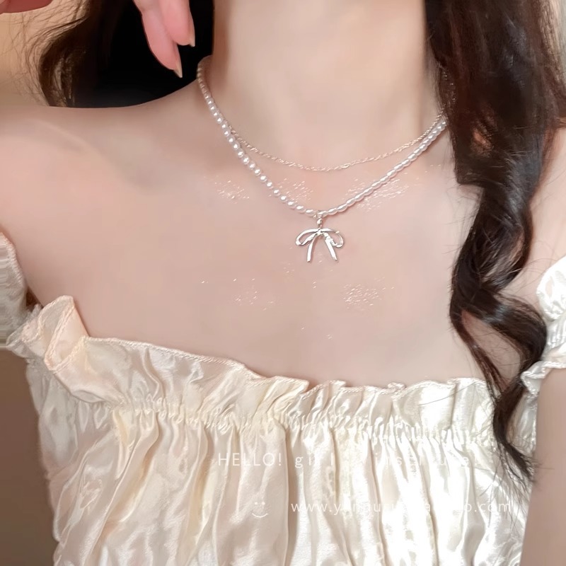 Double-layer bow pearl necklace for women, 2025 new style, light luxury collarbone chain feel, elegant and versatile, sweet necklace details Picture