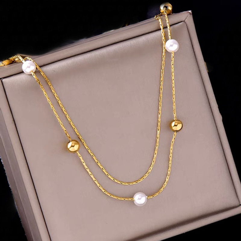 European and American fashion, niche and unique double-layer chain imitation pearl round bead titanium steel stacked accessory collarbone necklace full figure