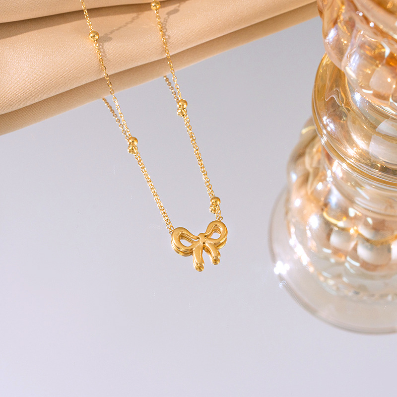 Titanium steel simple bean chain bow necklace, women's bracelet and stud three-piece set, non-fading, elegant and light luxury collarbone chain Specification drawing