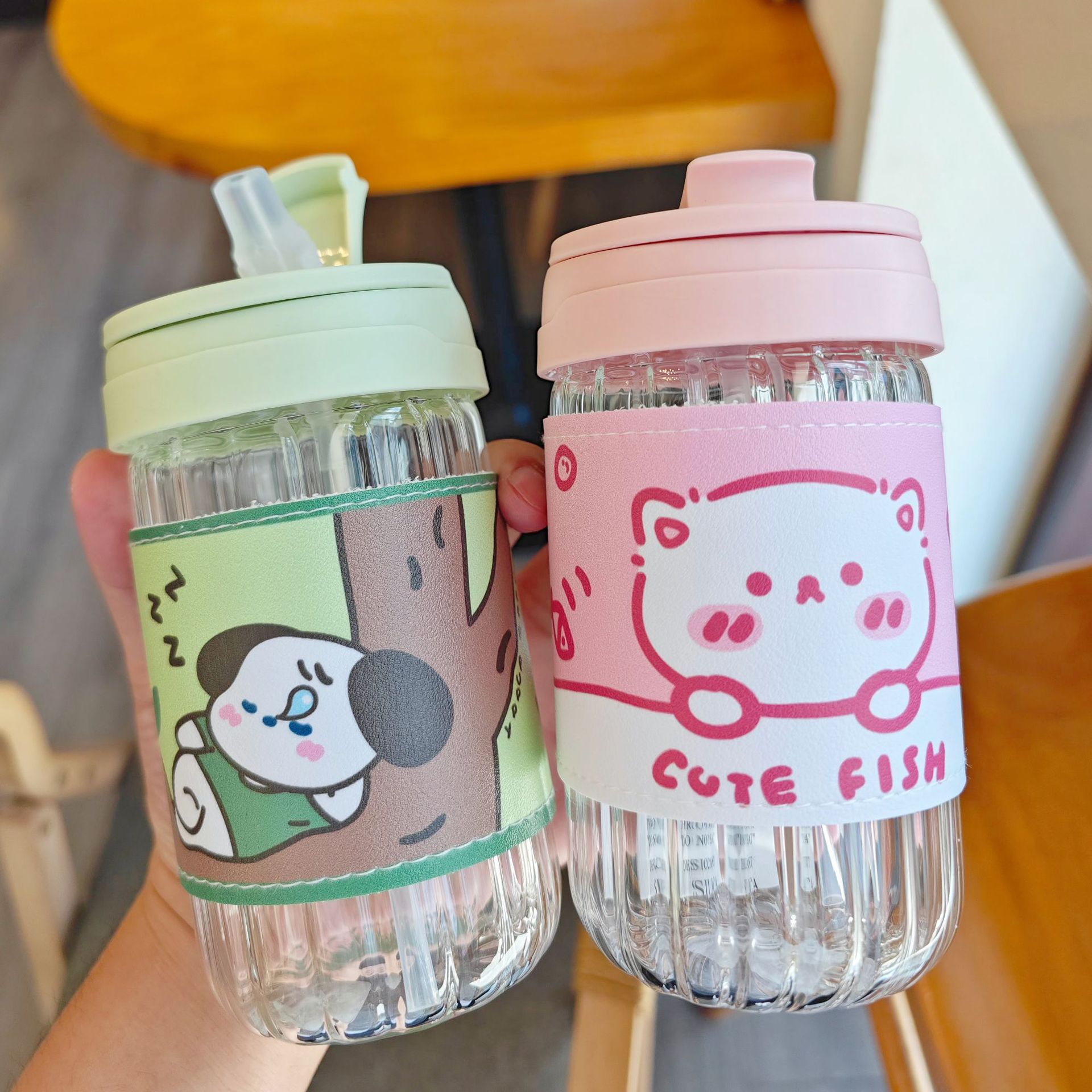 Cute girl glass cup, anti-scald, high appearance level cartoon water cup with leather case, portable, hand-held, heat-resistant cup full figure