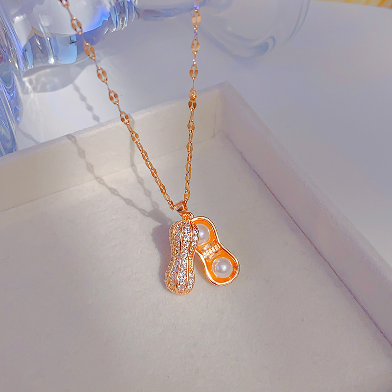 A bestseller on Xiaohongshu, the pearl and peanut necklace with zircon inlaid for women, is a versatile accessory that can be opened Application Scenario
