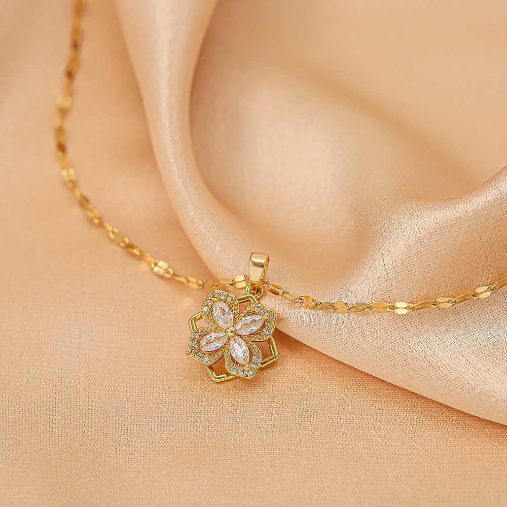 A full-diamond rotating four-leaf clover necklace for women with micro-inlaid double-layer zircon pendant and titanium steel collarbone chain, a simple and light luxury accessory Specification drawing