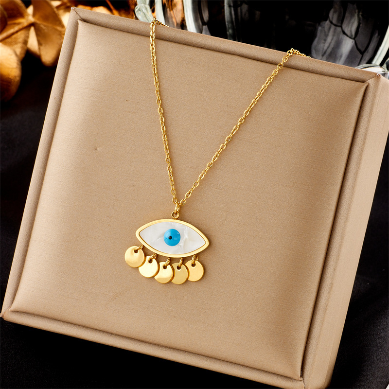 European and American unique, fashionable, creative and niche design, round tassel, oval blue eye pendant, stainless steel chain necklace full figure