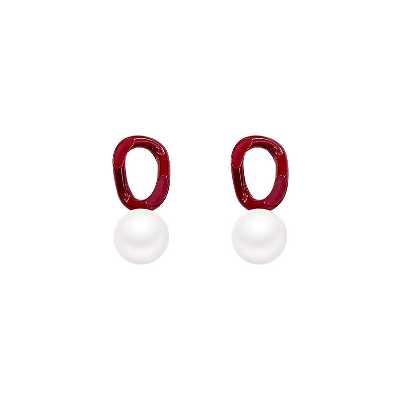 The Ankela red pearl contrasting color earrings for autumn and winter are versatile for women, with a retro and high-end feel. The commuter stud earrings are a unique and popular accessory Item Picture
