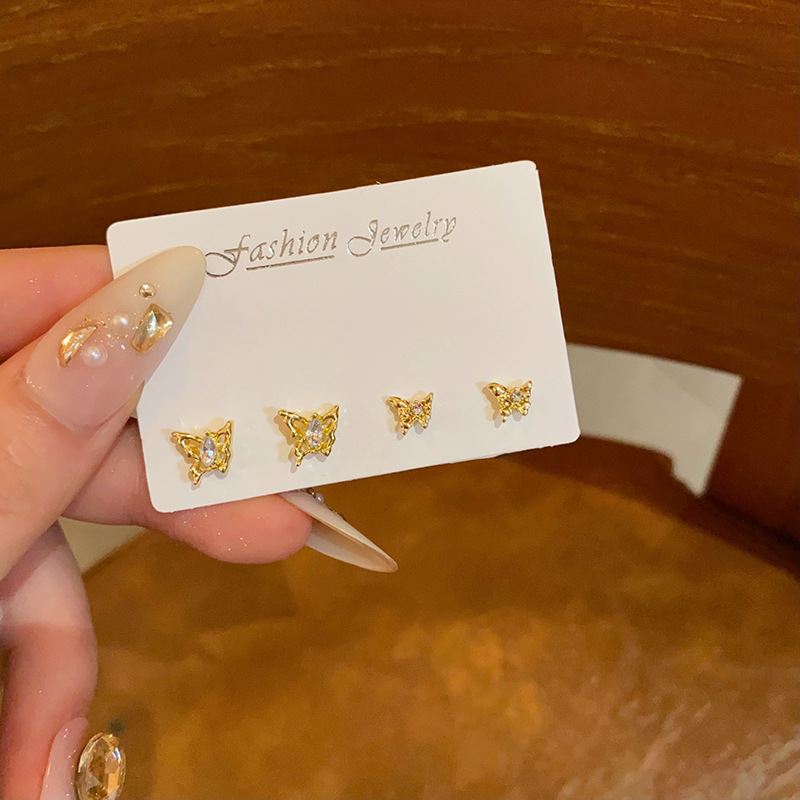 Golden diamond-encrusted butterfly set stud earrings for women, versatile and high-end style earrings, exquisite and small, internet-famous earrings wholesale full figure