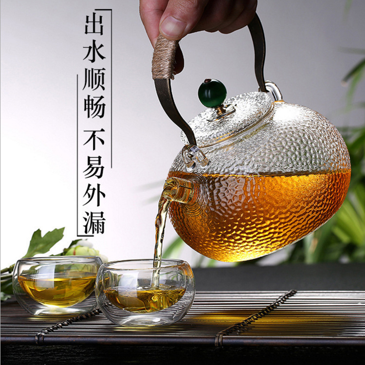 Wholesale high borosilicate glass teapots, thickened high-temperature resistant hammered glass teapots, copper handle teapots, filter spout flower teapots details Picture