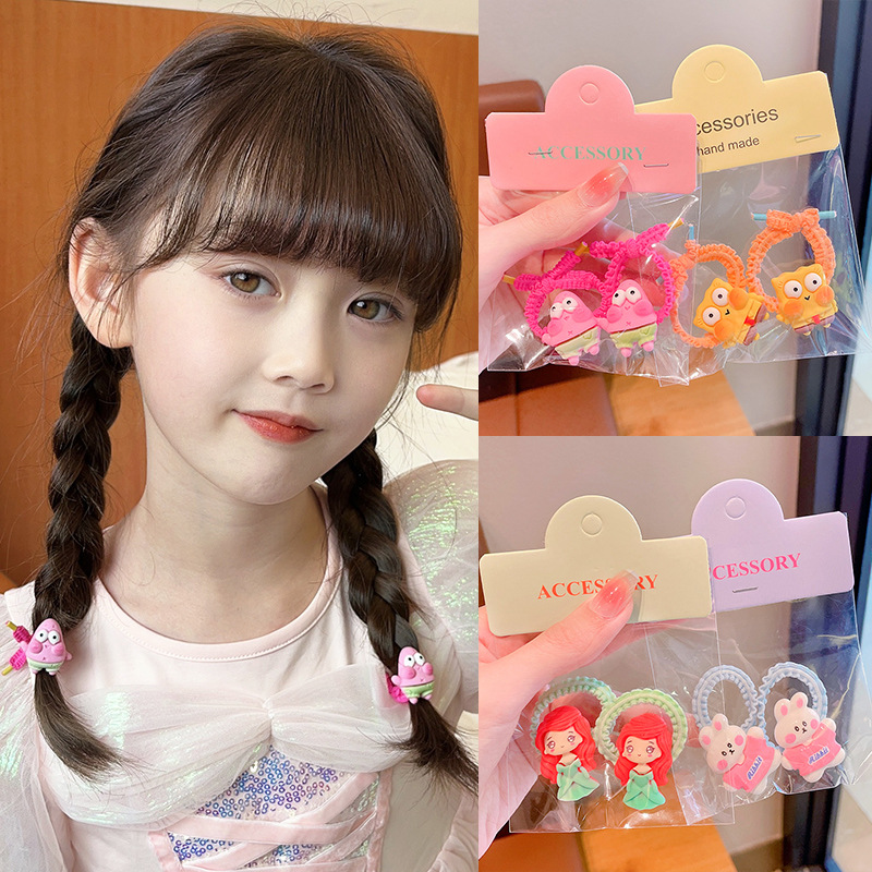 A new small-sized hair tie for children that doesn't damage their hair, a cute and good-looking headpiece with a rubber band and durable headwear details Picture