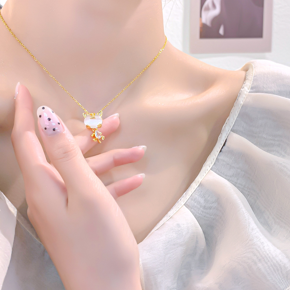 Japanese and Korean light luxury design sense cat's eye stone little tiger pendant titanium steel necklace, exquisite zircon high-end collarbone chain for women details Picture