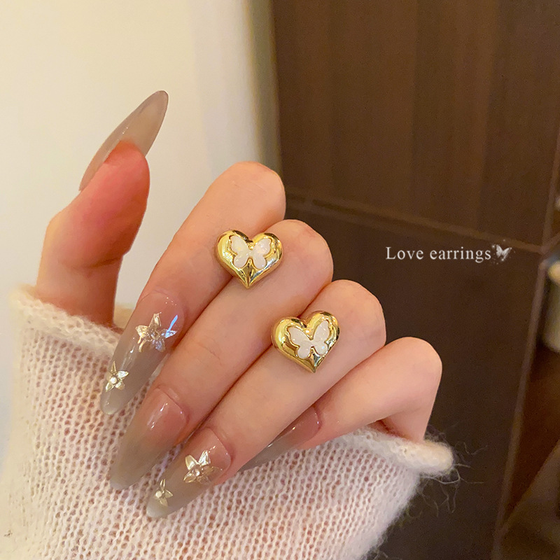 Three-dimensional heart-shaped butterfly shell stud earrings for women, fashionable and individual design sense, cross-border bestsellers from Europe and America, elegant earrings Specification drawing