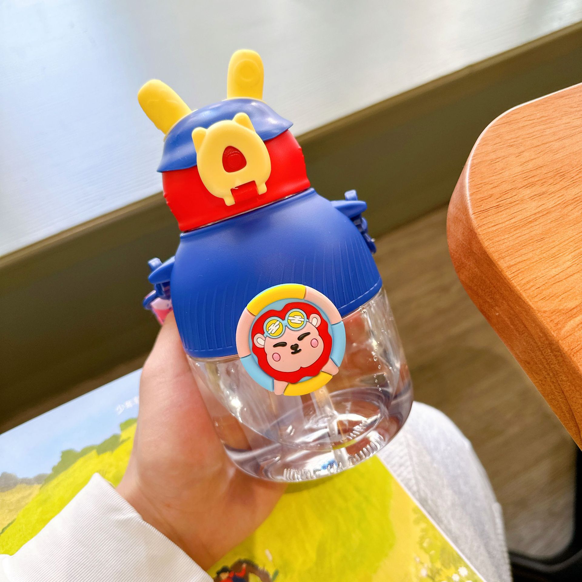 New children's straw cup with high appearance level cartoon straw cup, portable and cute plastic cup for students Application Scenario