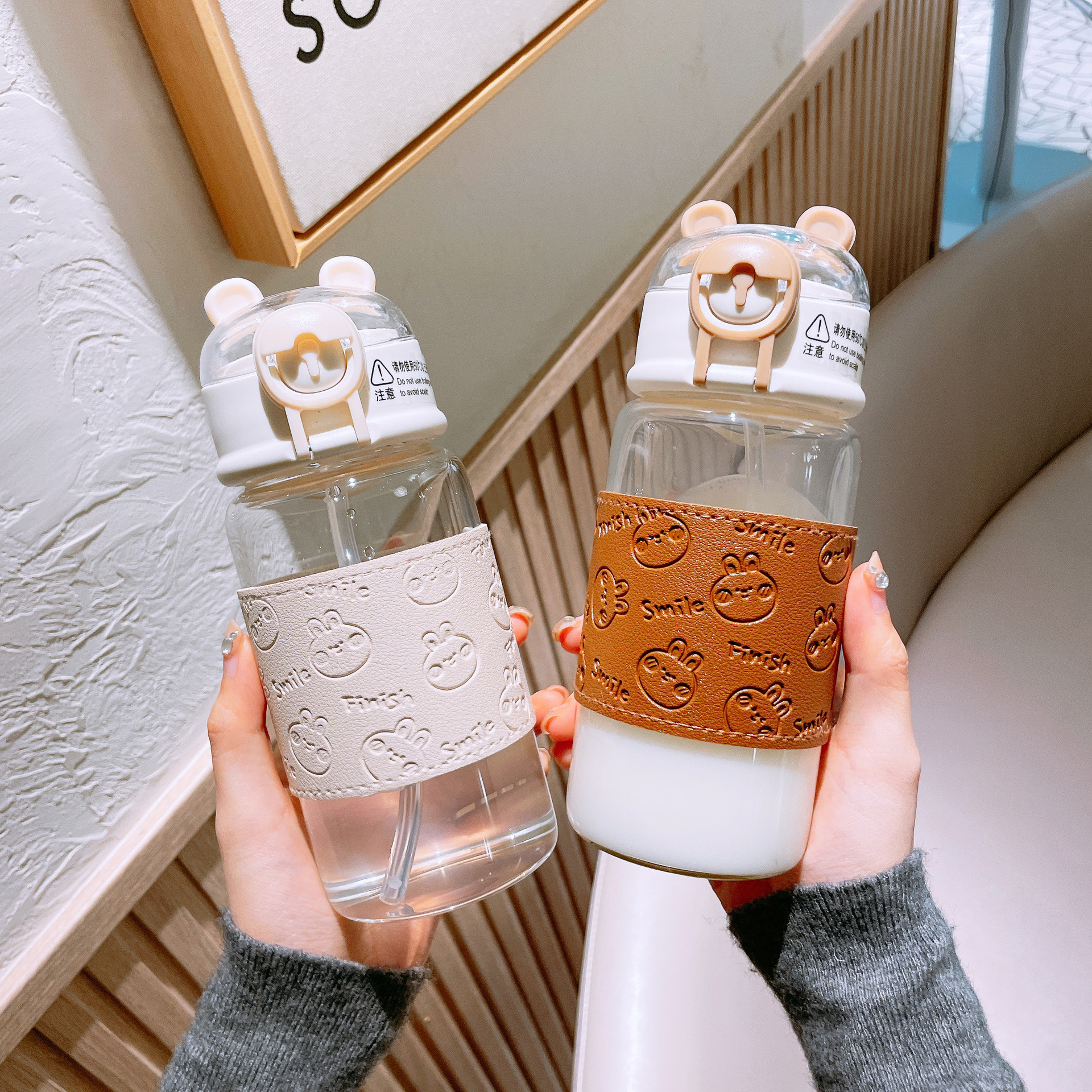 Cute leather case glass cups, cartoon embossed student straw cups, join hands to enhance the appearance level. Pop-up lid anti-scald portable cups Application Scenario