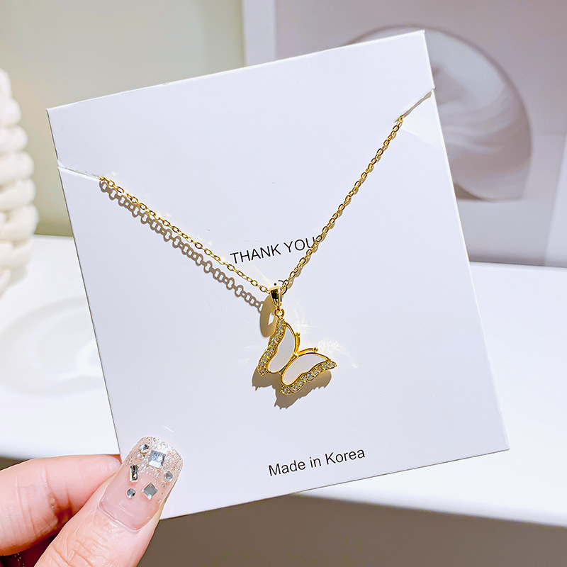 Korean 18k simple gold diamond-encrusted butterfly necklace, a niche design for women, a popular collarbone chain, a personalized and trendy accessory Application Scenario