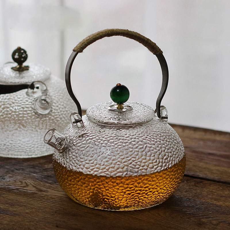 Wholesale high borosilicate glass teapots, thickened high-temperature resistant hammered glass teapots, copper handle teapots, filter spout flower teapots Application Scenario