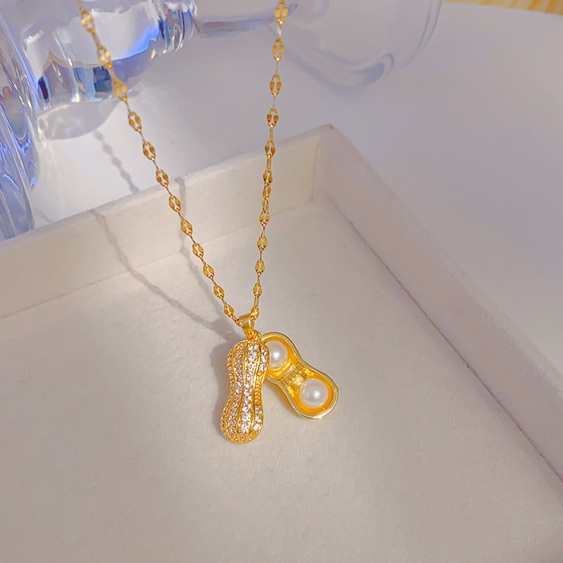 A bestseller on Xiaohongshu, the pearl and peanut necklace with zircon inlaid for women, is a versatile accessory that can be opened details Picture
