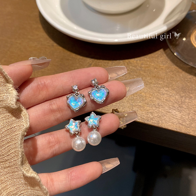 Deep blue water ripple heart-shaped stud earrings are unique, exquisite and versatile. Tassel pearl earrings are trendy and popular earrings full figure