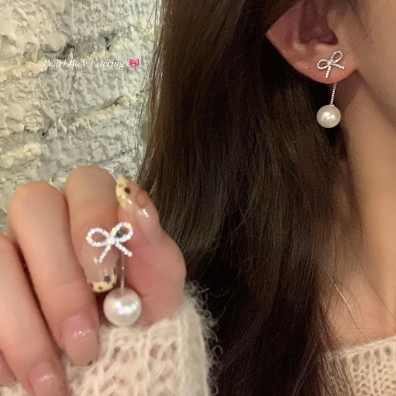 Autumn and winter collection of rear-hanging zirconium butterfly tassel earrings with a unique, light luxury and high-end look for women. Wholesale of pearl stud earrings full figure