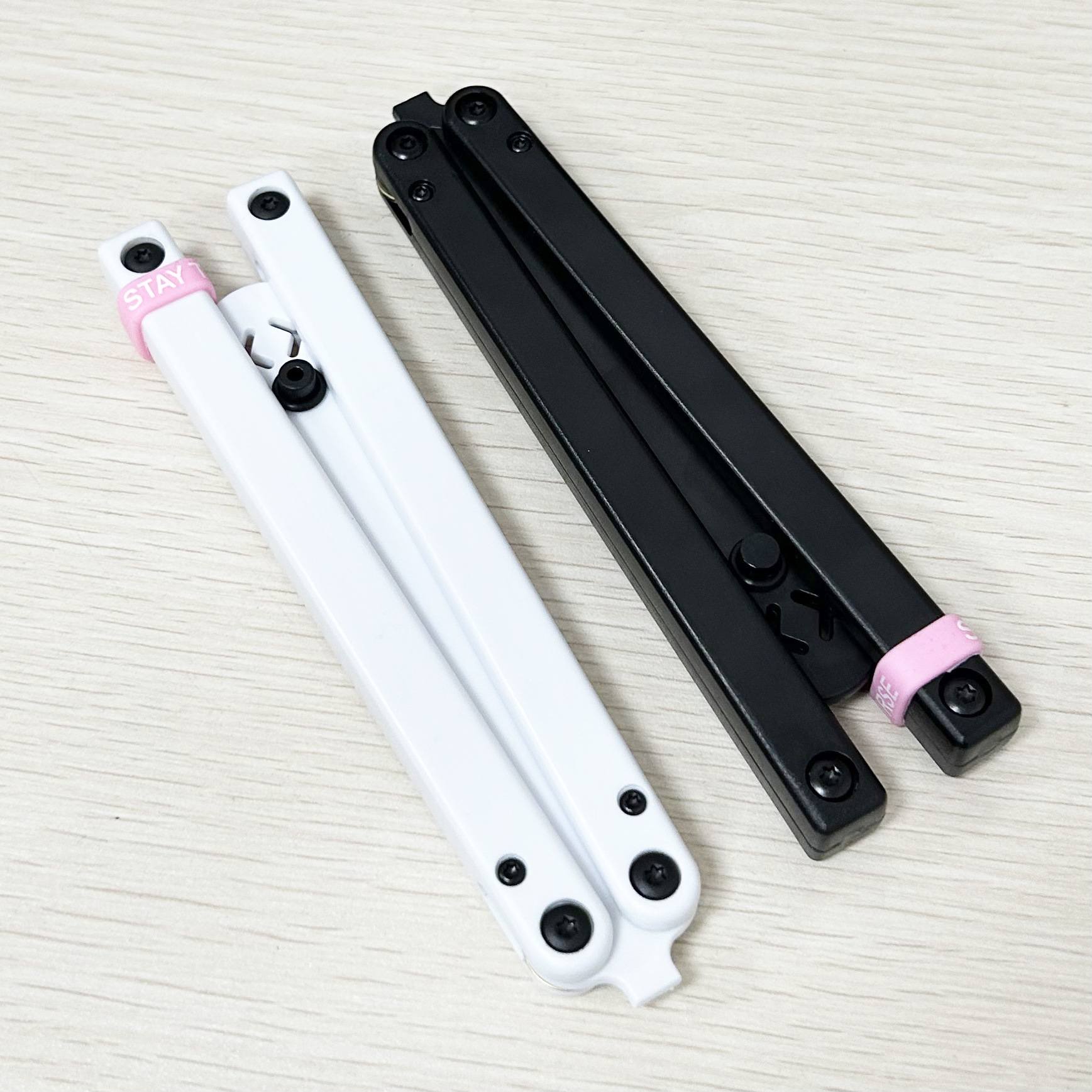 【 Cross-border Exclusive 】 Plastic black and white butterfly knife, uncut hand-swinging knife, plastic butterfly knife with UV printing pattern Item Picture