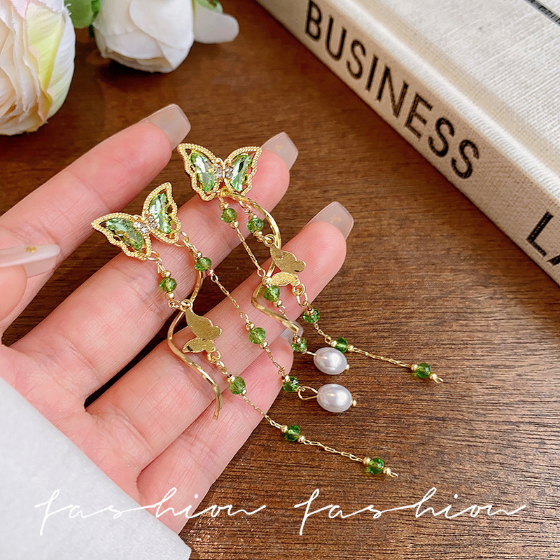 Forest-themed dynamic green butterfly earrings for women, French high-end style, long and face-enhancing small tassel earrings, trendy earrings full figure