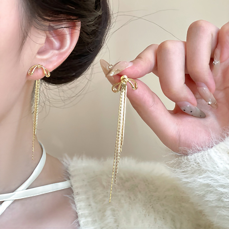 Silver bow tassel earrings for women, a new 2025 bestseller with a high-end feel. One pair of earrings with a cool and refreshing look Application Scenario