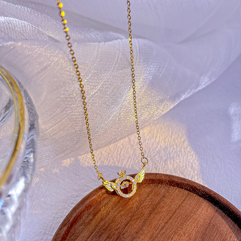 "Light luxury Angel Wing Pendant, dynamic titanium steel necklace, women's Instagram personalized style, popular collarbone chain, versatile accessory. details Picture