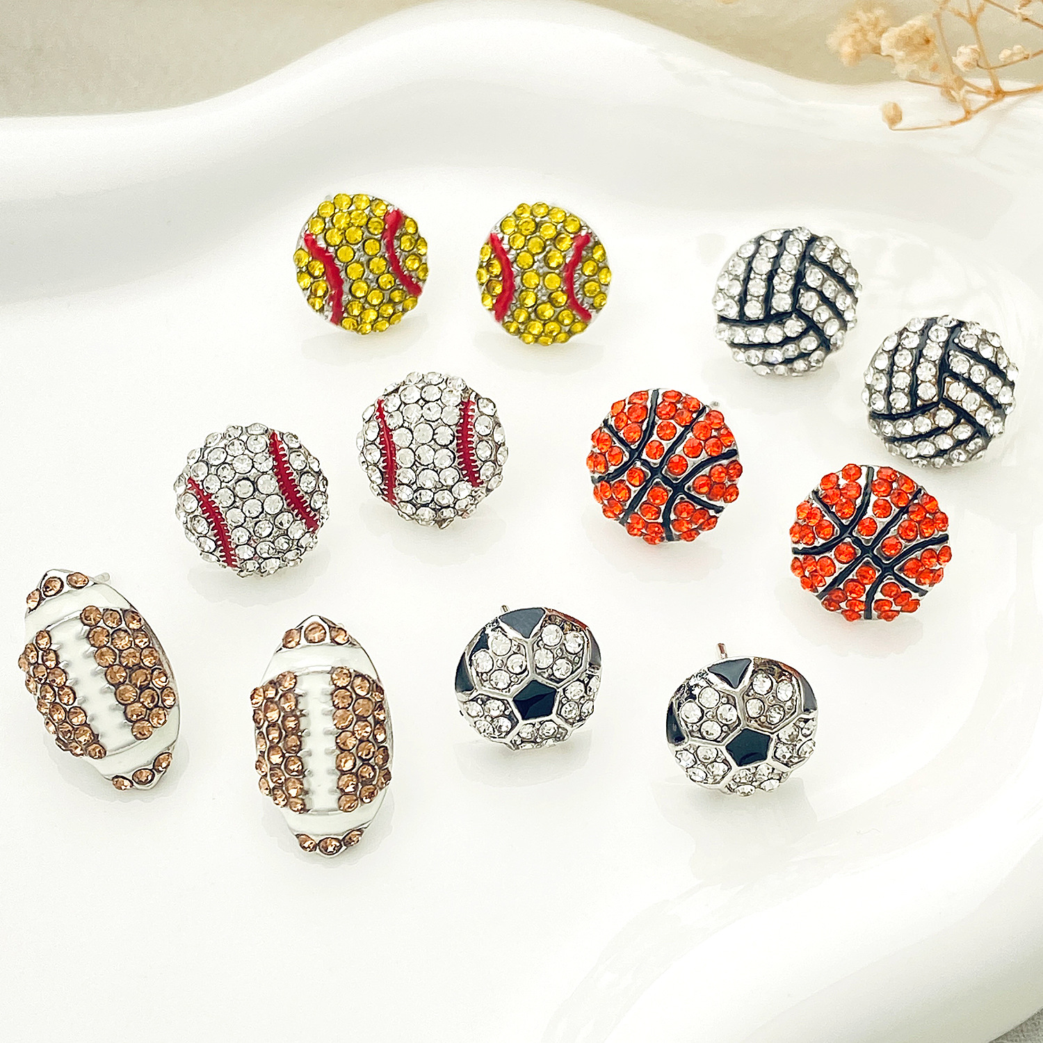 Cross-border new diamond-encrusted ball sports stud earrings for men and women, InS-style European and American creative design rugby football earrings full figure